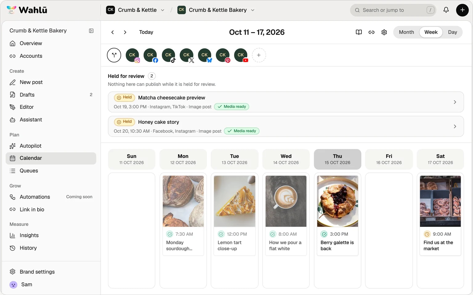 Wahlu week calendar for an example café, with scheduled posts and two held for review